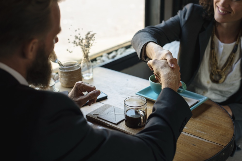 Business handshake — global trade missions and partnerships